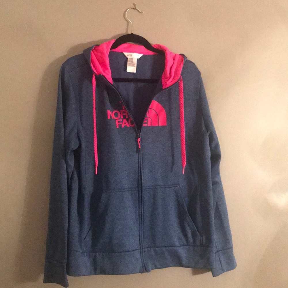 blue and pink North Face zip up sweater